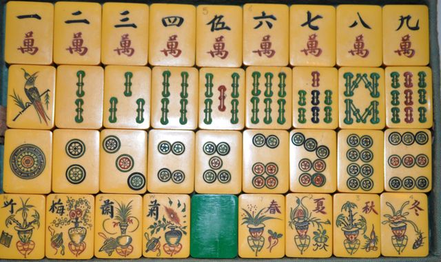 Solid ivory mahjong tiles, mid 20th century. The tiles were wrapped in  cellphone and unused as to their white appearance and…