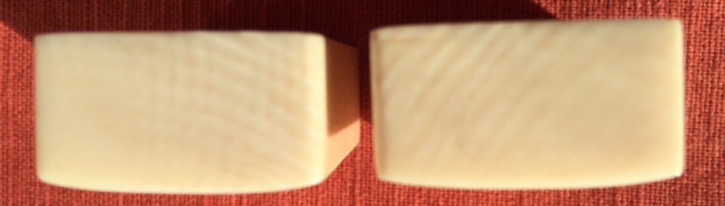 the cross-hatching only found in ivory is noticeable on the sides of these tiles