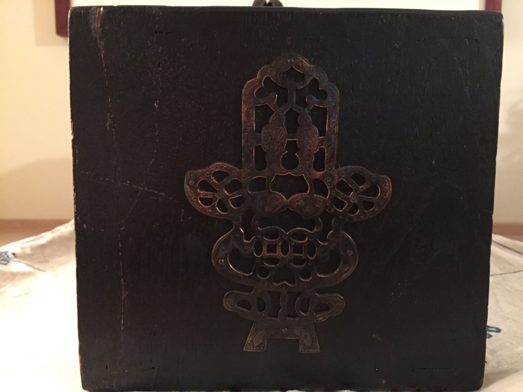 side of box with brass detail