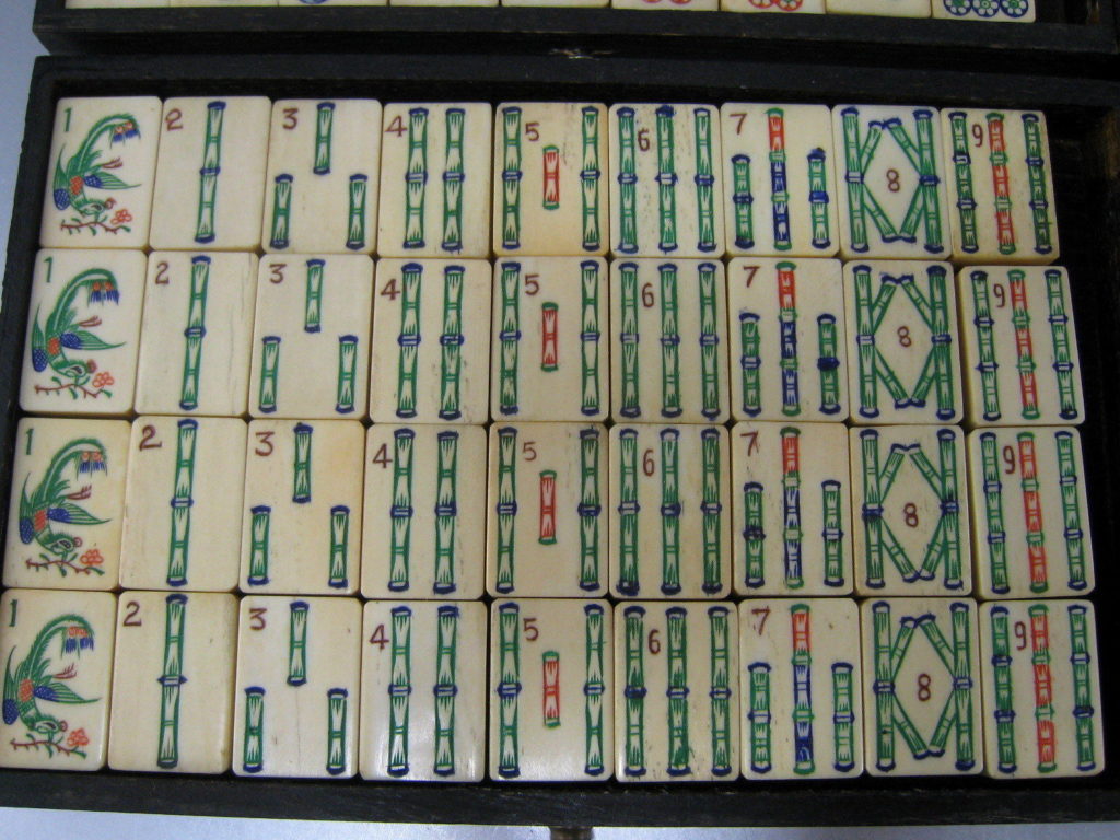 First game with my new tiles. I really love the bamboo back and how they feel when handling them. Sadly only with some two-player-riichi rules I found online : r/Mahjong